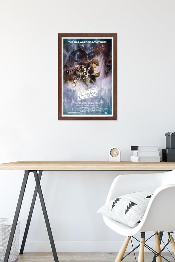 Trends International Star Wars: The Empire Strikes Back - The Saga Continues One Sheet Wall Poster, 14.725" x 22.375", Mahogany Framed Version