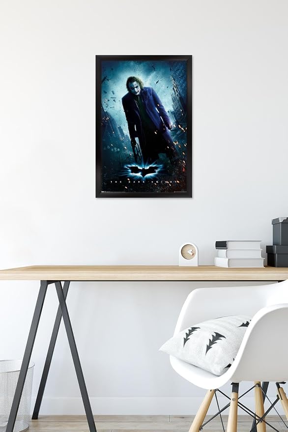 Trends International DC Comics Movie - The Dark Knight - The Joker - One Sheet Wall Poster, 14.725" x 22.375", Black Framed Version