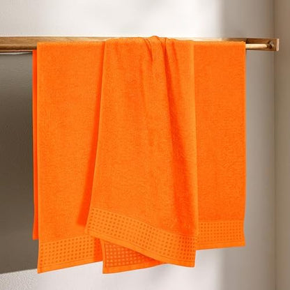 GLAMBURG Ultra Soft 4 Pack Oversized Bath Towel Set 27x54 inches, 100% Cotton Bath Towels, Highly Absorbant Compact Quickdry & Lightweight Towel, Ideal for Gym Travel Camp Pool - Orange