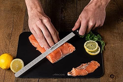 Arcos Salmon Knife/Fish Knife 11 Inch Nitrum Stainless Steel and 290 mm blade. Ergonomic Polyoxymethylene POM Handle. Series Universal. Long, sturdy blade and serrated edge. Easily cuts. Color Black