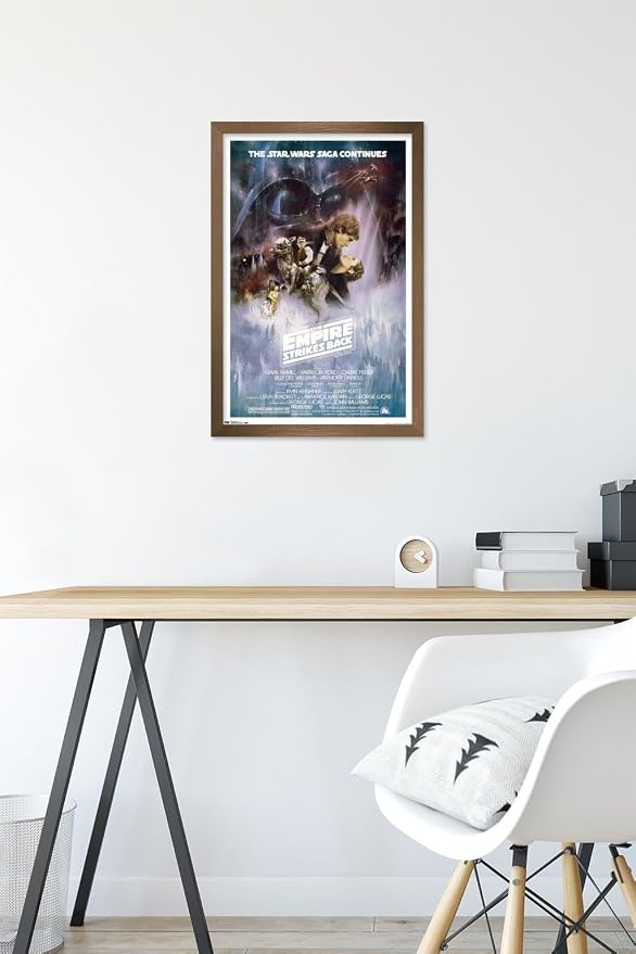 Trends International Star Wars: The Empire Strikes Back - The Saga Continues One Sheet Wall Poster, 14.725" x 22.375", Bronze Framed Version