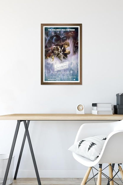 Trends International Star Wars: The Empire Strikes Back - The Saga Continues One Sheet Wall Poster, 14.725" x 22.375", Bronze Framed Version