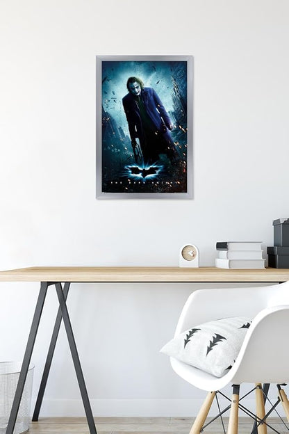Trends International DC Comics Movie - The Dark Knight - The Joker - One Sheet Wall Poster, 14.725" x 22.375", Silver Framed Version