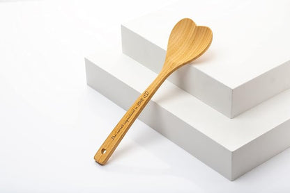 Gorgeous Heart shaped Bamboo Wooden Spoon with an engraved handle and heart-shaped base hole for hanging - 'The secret ingredient is Love' | The perfect addition to a kitchen filled with love and joy!