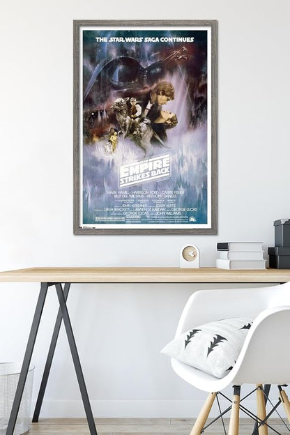 Trends International Star Wars: The Empire Strikes Back - The Saga Continues One Sheet Wall Poster, 22.375" x 34", Barnwood Framed Version