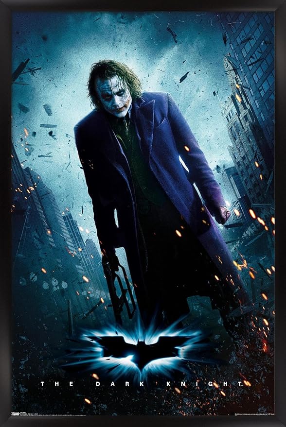 Trends International DC Comics Movie - The Dark Knight - The Joker - One Sheet Wall Poster, 14.725" x 22.375", Black Framed Version