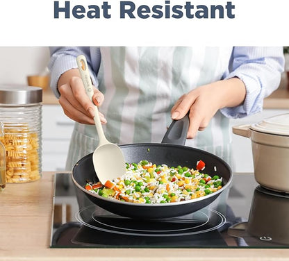 Person cooking stir-fry in a pan with a spatula, text 'Heat Resistant' above.