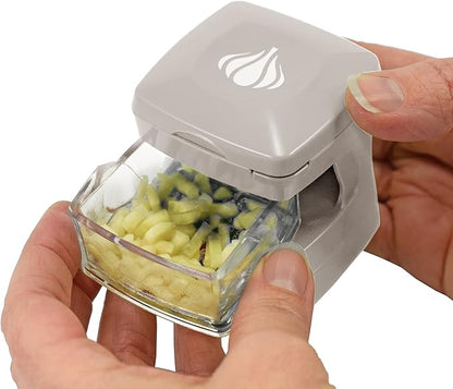 Garlic-A-Peel Garlic Press, Crusher, Cutter, Mincer, and Storage Container - Includes Silicone Garlic Peeler - Easy to Clean - Stainless Steel Blades – (Cream), standard