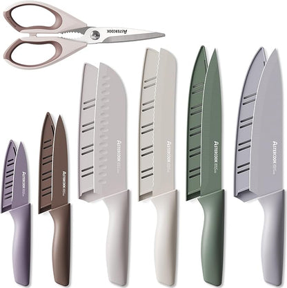 Set of knives with various handles on a white background