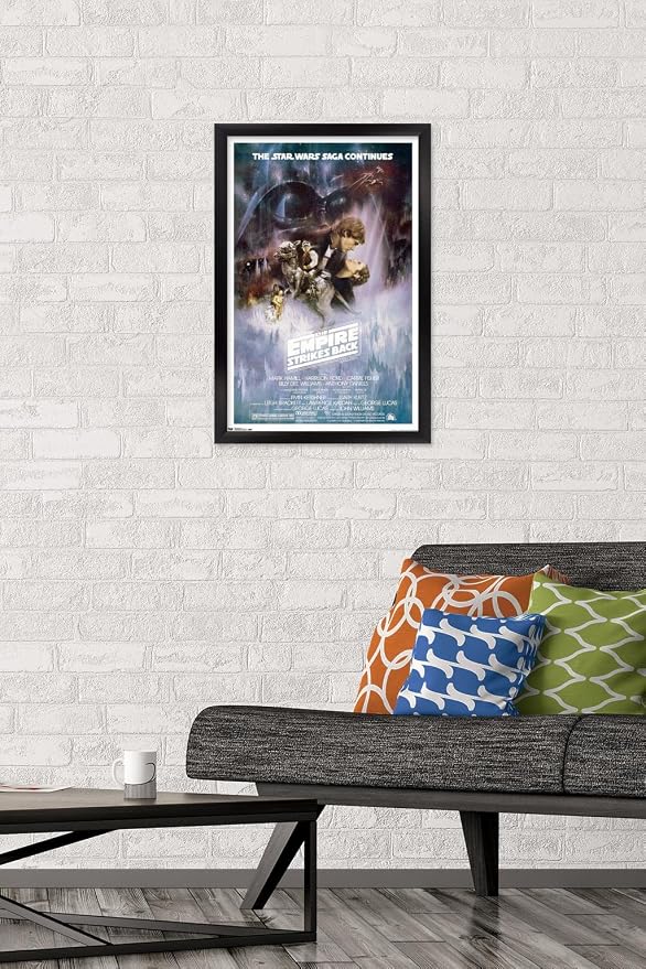 Trends International Star Wars: The Empire Strikes Back - The Saga Continues One Sheet Wall Poster, 14.725" x 22.375", Black Framed Version