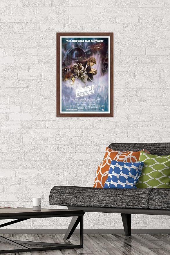 Trends International Star Wars: The Empire Strikes Back - The Saga Continues One Sheet Wall Poster, 14.725" x 22.375", Mahogany Framed Version