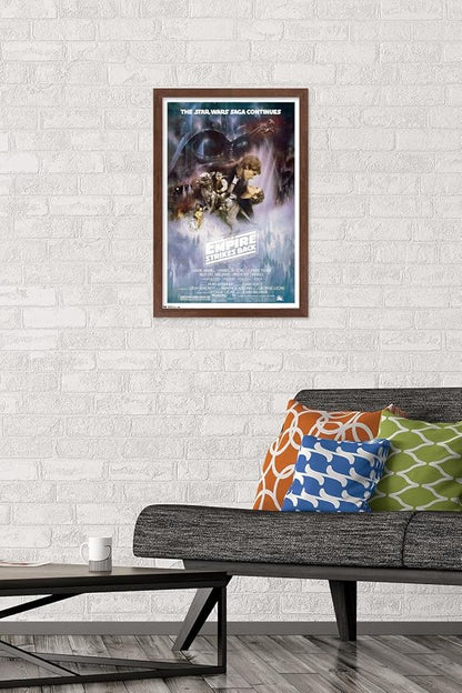 Trends International Star Wars: The Empire Strikes Back - The Saga Continues One Sheet Wall Poster, 14.725" x 22.375", Mahogany Framed Version