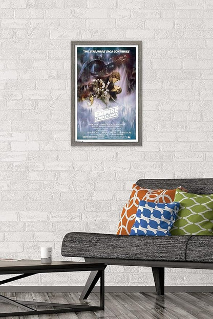 Trends International Star Wars: The Empire Strikes Back - The Saga Continues One Sheet Wall Poster, 14.725" x 22.375", Barnwood Framed Version