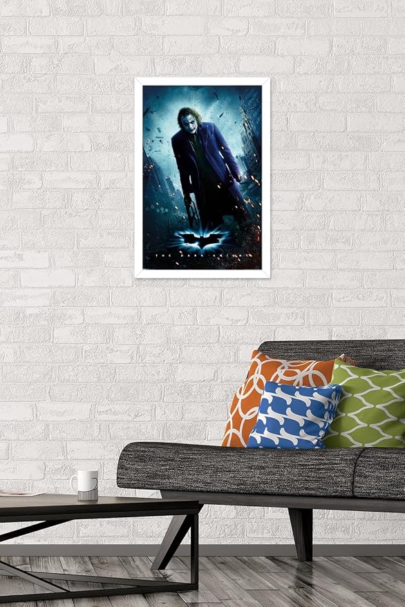 Trends International DC Comics Movie - The Dark Knight - The Joker - One Sheet Wall Poster, 14.725" x 22.375", White Framed Version