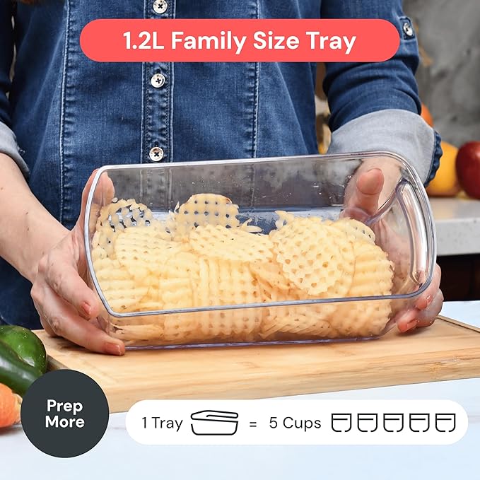 Person holding a glass food storage container with pasta, labeled '1.2L Family Size Tray'.