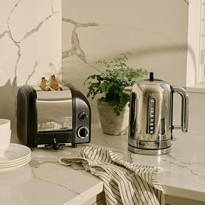 Dualit Classic 2 Slice NewGen Toaster - Stainless Steel - Hand Built in the UK - Replaceable ProHeat elements - Defrost Bread - Mechanical Timer - Matt Black Classic Toaster