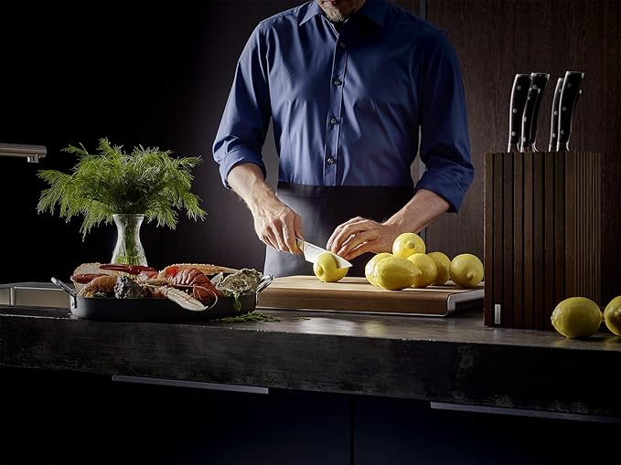 WÜSTHOF IKON Blackwood 7" Hollow Edge Santoku Knife