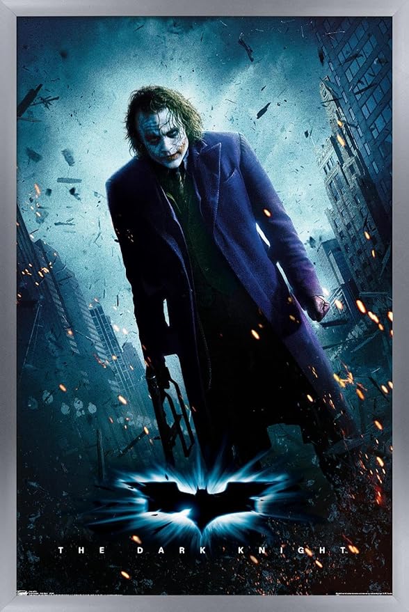 Trends International DC Comics Movie - The Dark Knight - The Joker - One Sheet Wall Poster, 14.725" x 22.375", Silver Framed Version