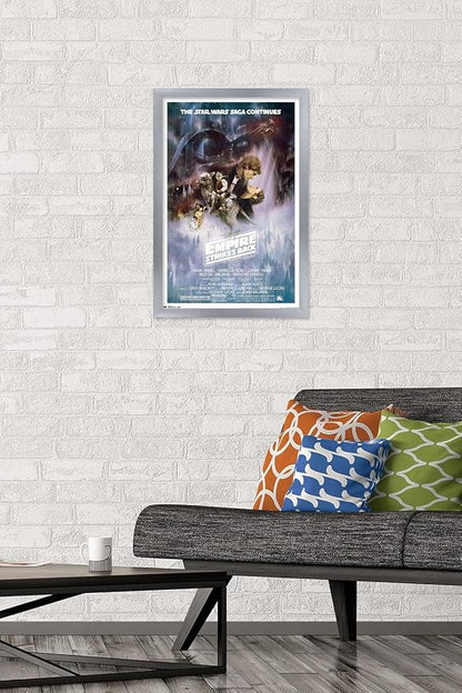 Trends International Star Wars: The Empire Strikes Back - The Saga Continues One Sheet Wall Poster, 14.725" x 22.375", Silver Framed Version