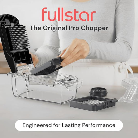 Person using a kitchen chopper with 'fullstar' branding on a white background