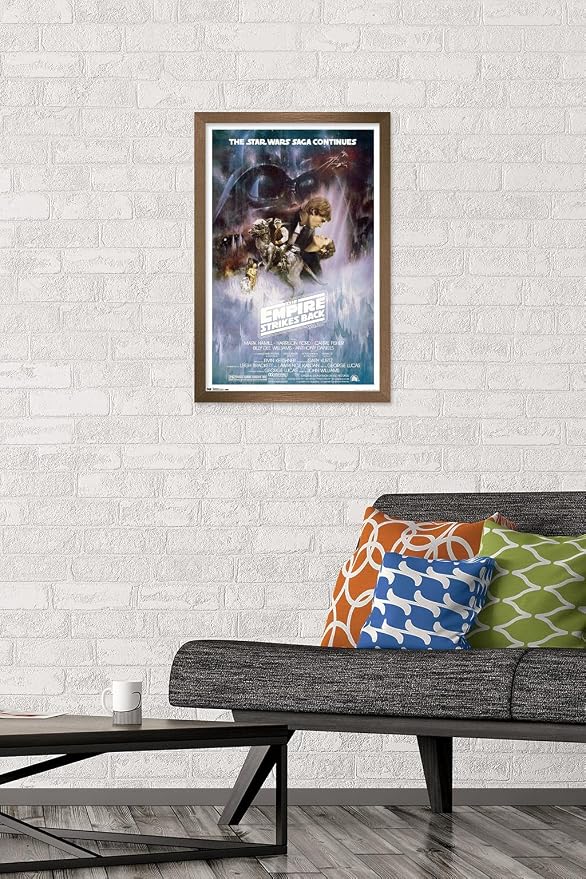 Trends International Star Wars: The Empire Strikes Back - The Saga Continues One Sheet Wall Poster, 14.725" x 22.375", Bronze Framed Version