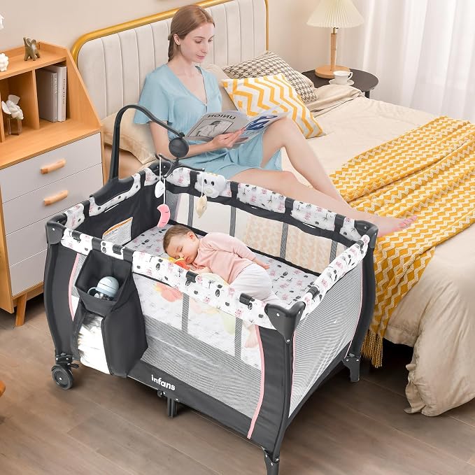 INFANS 3 in 1 Pack and Play, Portable Travel Baby Bassinet with Detachable Mattress, Changing Table, Foldable Playpen with Carry Bag, 2 Wheels (Cartoon)