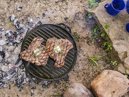 Lodge Cast Iron Cook-It-All Kit. Five-Piece Cast Iron Set includes a Reversible Grill/Griddle 14 Inch, 6.8 Quart Bottom/Wok, Two Heavy Duty Handles, and a Tips & Tricks Booklet.